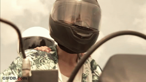 Person On Shoulder In Motorcycle Helmet GIF