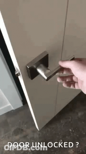 Person Opening Door Saying Door Unlocked GIF