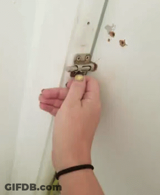 Person Opening Door With Key GIF
