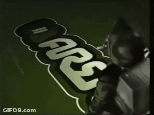 Person Painting Carlsberg On Green Background GIF