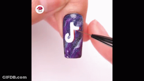 Person Painting TikTok Logo On Purple Nail GIF