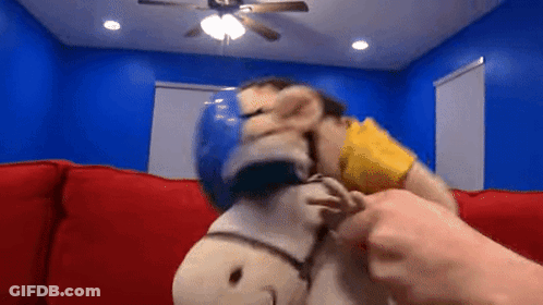Person Petting Stuffed Animal On Couch GIF