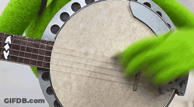 Person Playing Banjo With Green Glove GIF