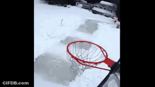 Person Playing Basketball In Snow GIF