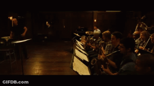 Person Playing Drums With Fender Logo GIF