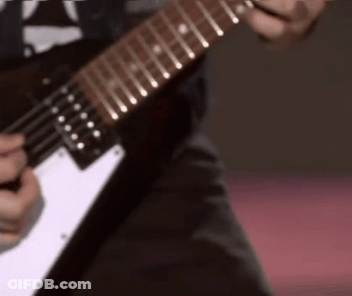 Person Playing Electric Guitar Pink Background GIF