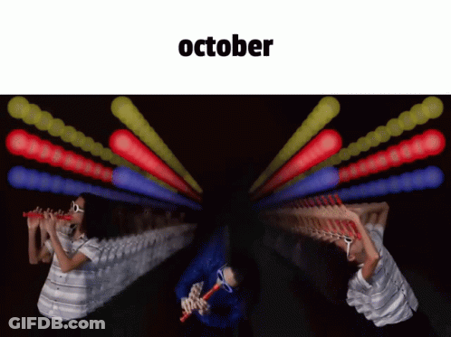 Person Playing Flute With October Above GIF
