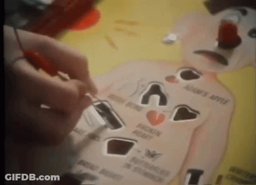 Person Playing Game With Broken Heart And Adam's Apple GIF