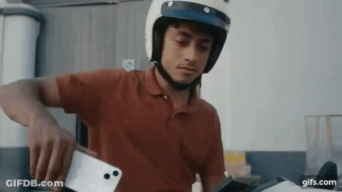 Person Playing IPod Saying Tehat GIF