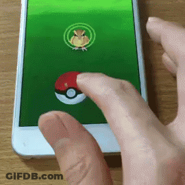 Person Playing Pokemon On Phone GIF