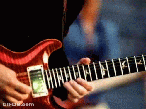 Person Playing Red Electric Guitar GIF