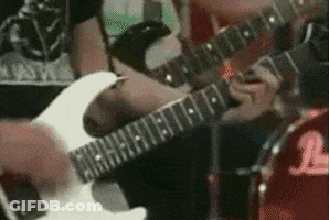 Person Playing White Guitar With L GIF
