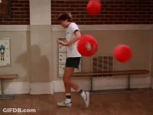 Person Playing With Red Balls GIF