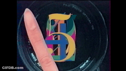 Person Pointing At Fuji Lens GIF