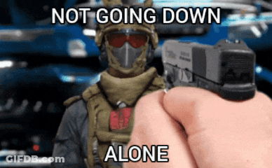 Person Pointing Gun At Soldier Saying Not Going Down Alone GIF