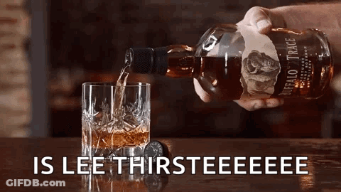 Person Pouring Buffalo Trace Whiskey Into Glass GIF