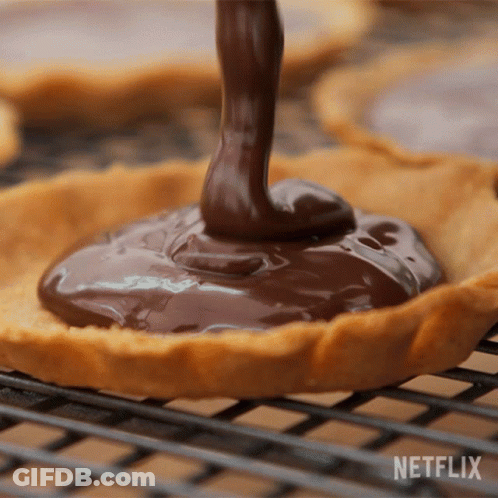 Person Pouring Chocolate Behind Netflix Logo GIF