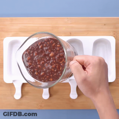 Person Pouring Chocolate GIF