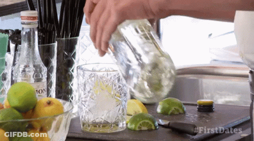 Person Pouring Drink Into Glass With First Dates GIF