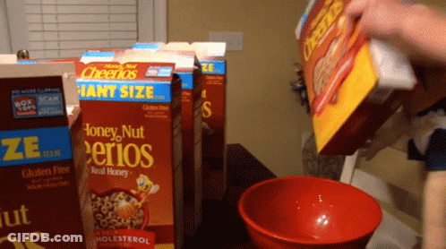 Person Pouring Honey Nut Cheerios Into Red Bowl GIF