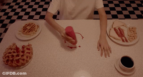 Person Pouring Ketchup On Food GIF