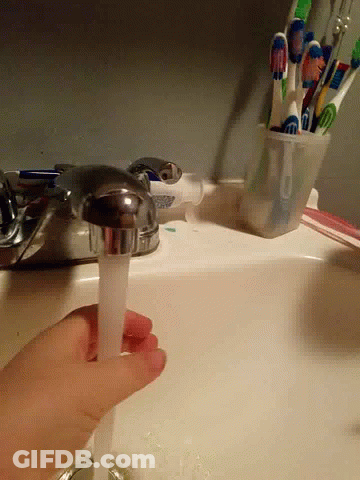 Person Pouring Toothpaste Into Faucet GIF