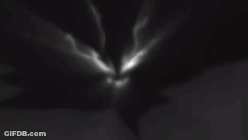 Person Pouring Wine Into Glass With Knife GIF