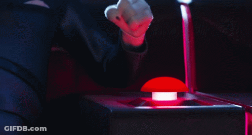 Person Pressing Red Button In Dark GIF
