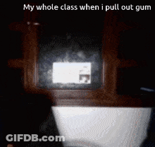 Person Pulling Gum From Box GIF