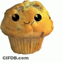 Person Putting Chocolate Chips In Cupcake GIF