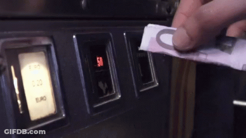 Person Putting Euro Bill Into Machine GIF