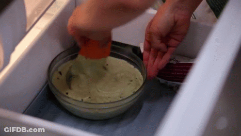 Person Putting Food In Refrigerator GIF