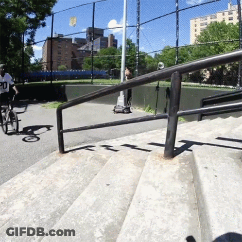 Person Riding Bike With Number 20 GIF