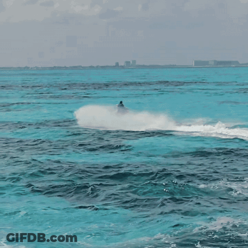 Person Riding Jet Ski GIF
