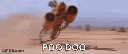 Person Riding Motorcycle In Desert Saying Poo Doo GIF