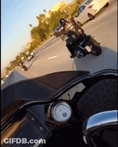 Person Riding Motorcycle On Highway Saying No GIF