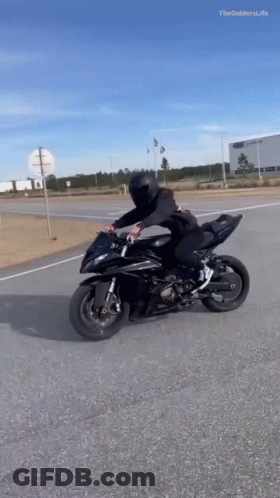 Person Riding Motorcycle Saying The Guiders Life GIF