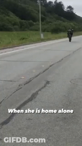 Person Riding Motorcycle When She Is Home Alone GIF