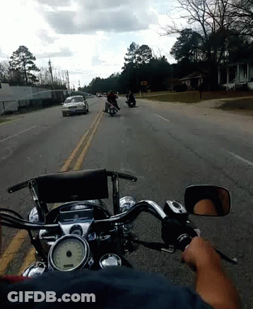 Person Riding Motorcycle With Speedometer Saying MPH GIF