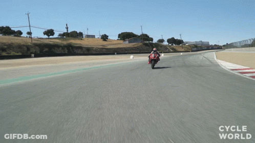 Person Riding Red Motorcycle On Track Cycle World GIF