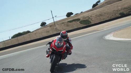Person Riding Red Motorcycle On Track Cycle World GIF