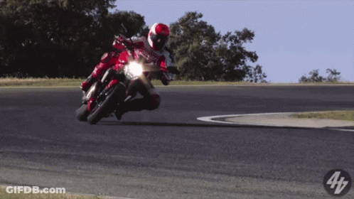 Person Riding Red Motorcycle With Number 4 GIF