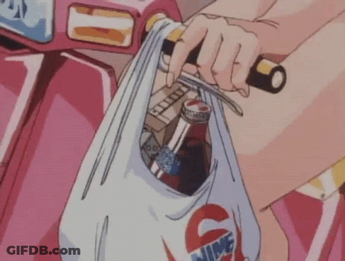 Person Riding Scooter With Plastic Bag Of Groceries GIF
