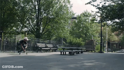 Person Riding Skateboard In Park GIF