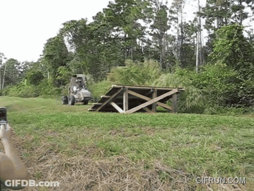 Person Riding Tractor GIF