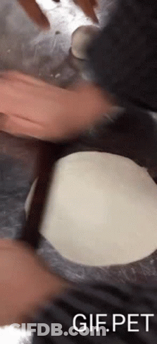 Person Rolling Dough Gif.pet GIF