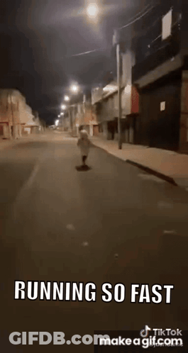 Person Running Down Street At Night Saying Running So Fast GIF