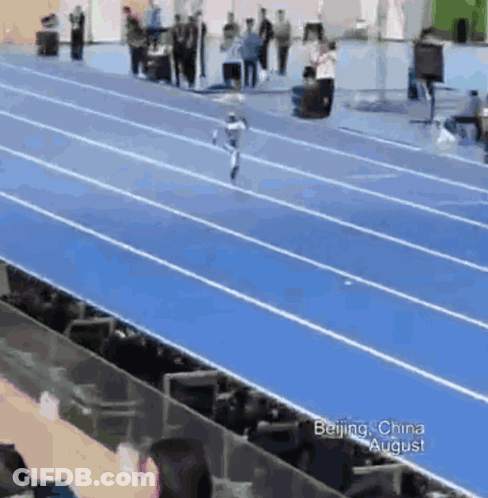 Person Running On Track In Beijing GIF