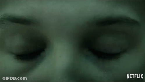 Person's Eyes With Netflix Logo GIF