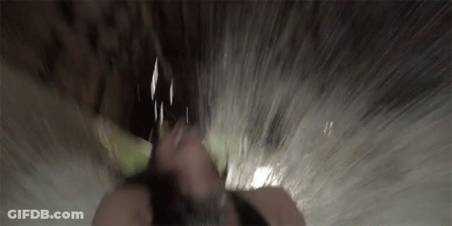 Person's Face Close Up In Waterfall GIF